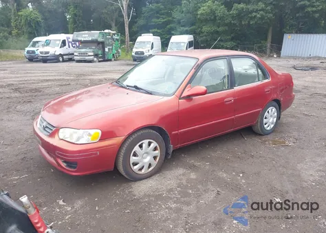 2002 Toyota Corolla Le z USA, uszkodzony, nr VIN 2T1BR12E22C530248